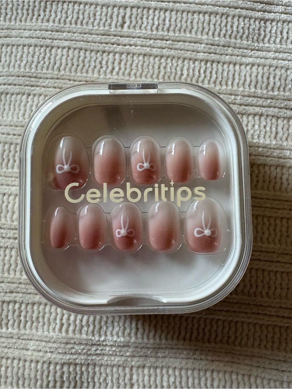 Celebritips Pink Press-On Nail Set with White Bow Accent Jennie Extra Short Oval